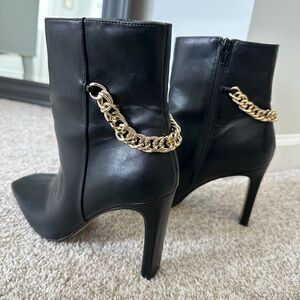 Express booties with gold chain detail